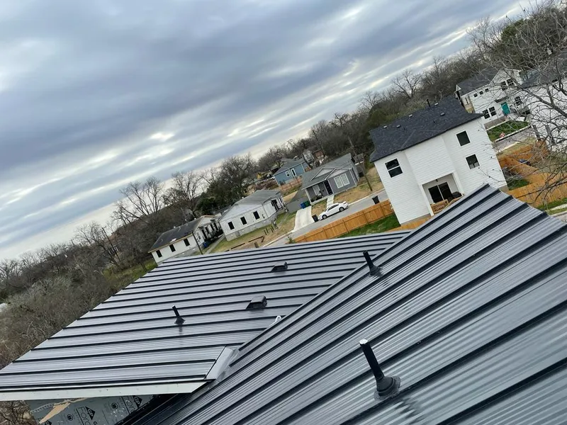 Standing seam metal roof panels with vents for Skylight Repair in Troy